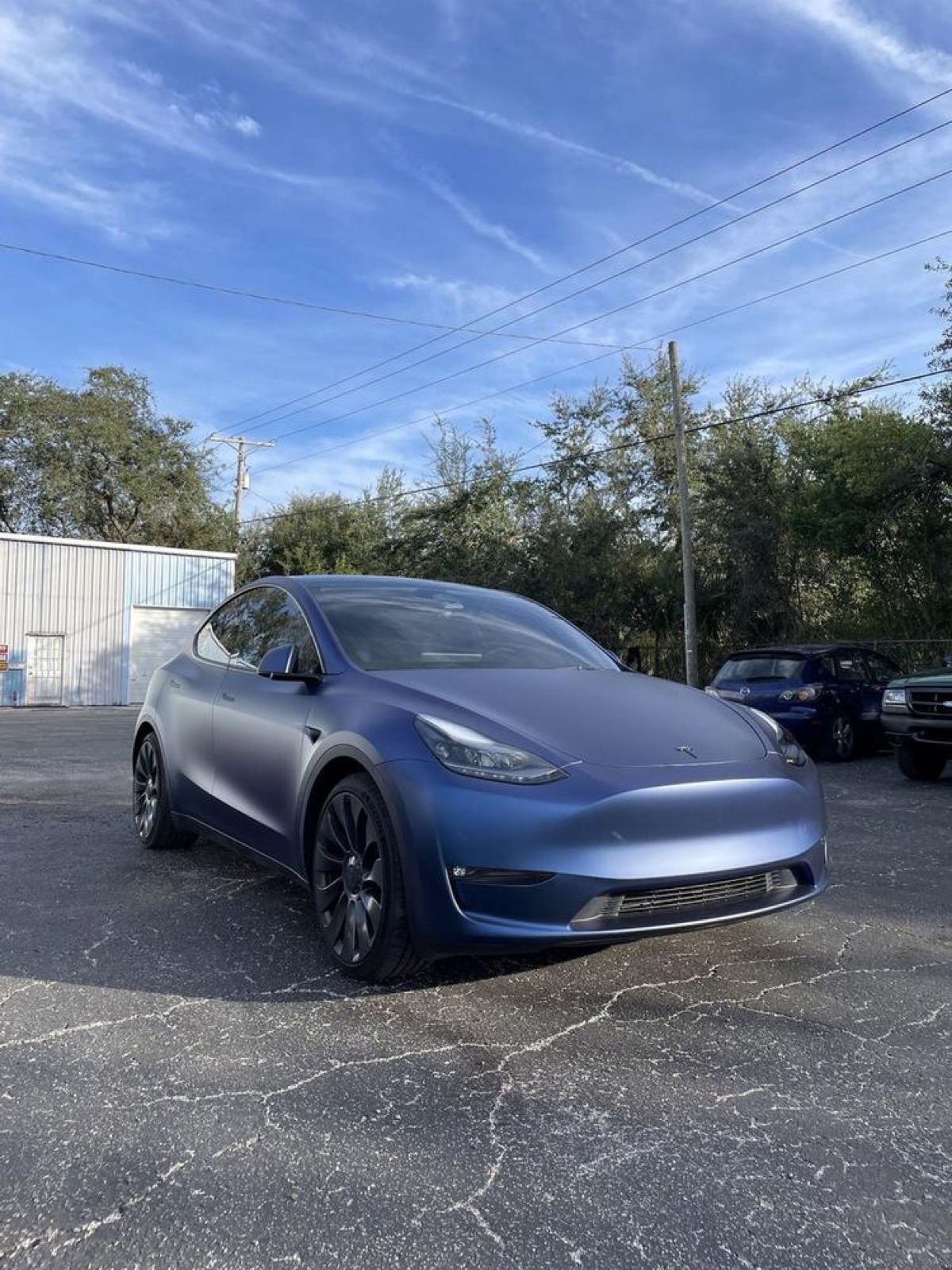 Tesla Model Y · our own operation